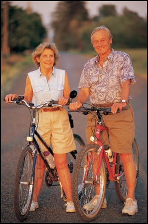 Older couple on bikes