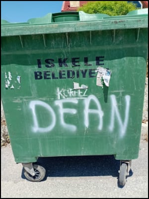 Dean's name on dumpster