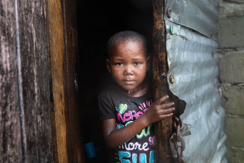 young child in poverty