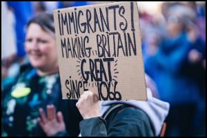 Protester holding sign