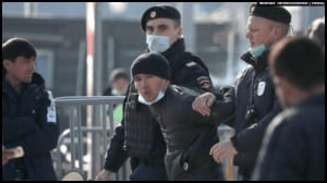Immigrant being arrested in Russia